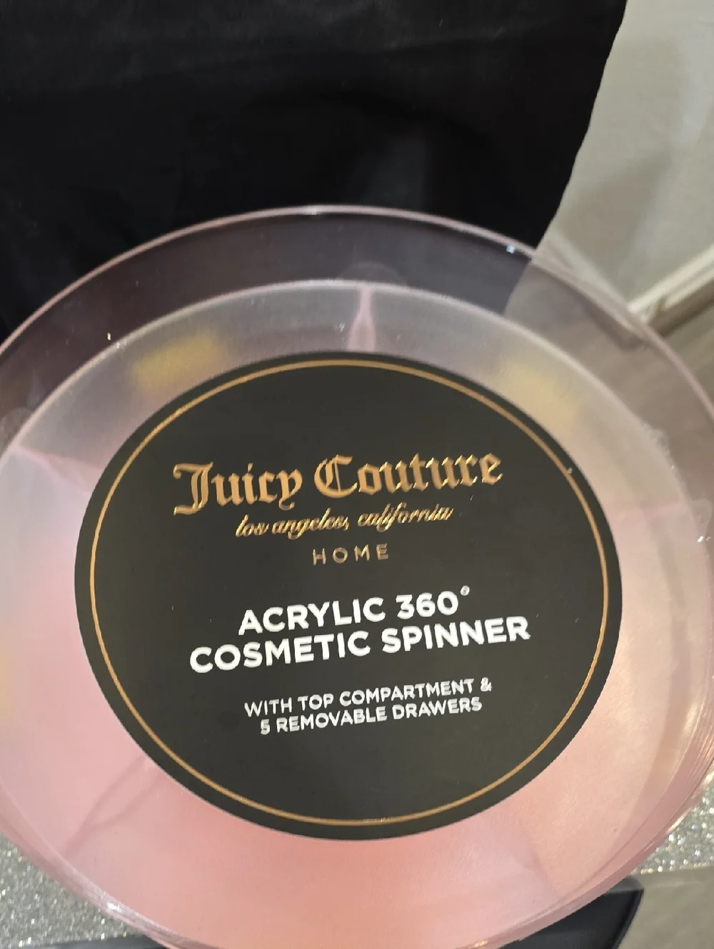 Juicy Couture rotating acrylic